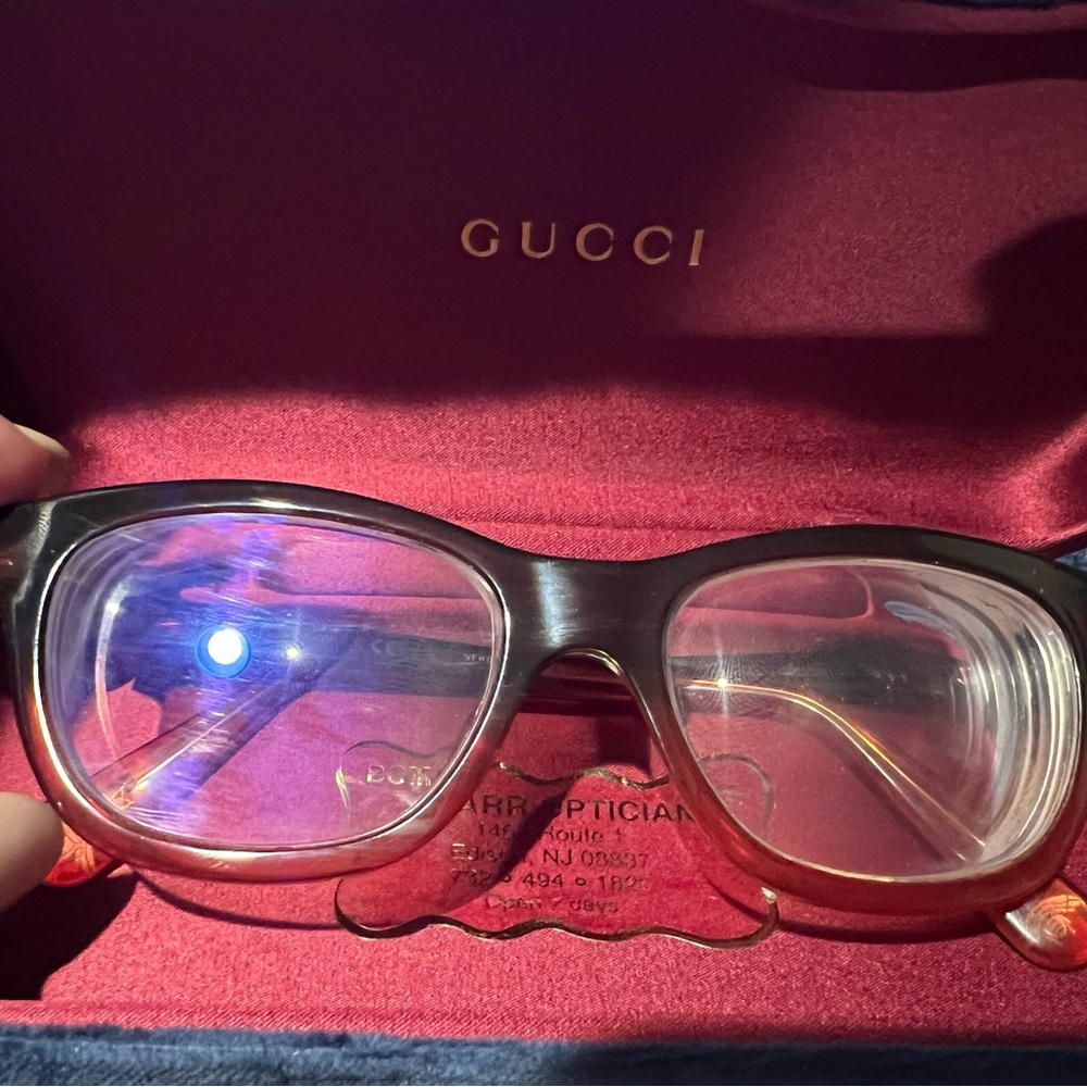 GUCCI glasses.